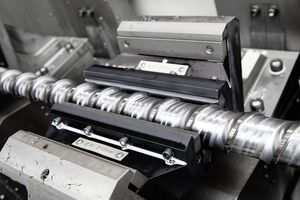 Another section of a injection molding screw clamped in a steady rest