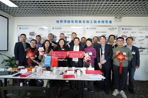 A group photo at a company opening celebration