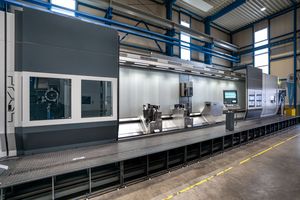 Angular view of a turning, milling and whirling center with its doors wide open