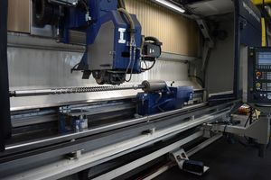 A belt polishing machine in operation