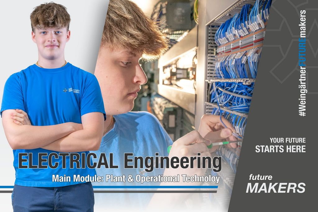 A young man wiring a control panel